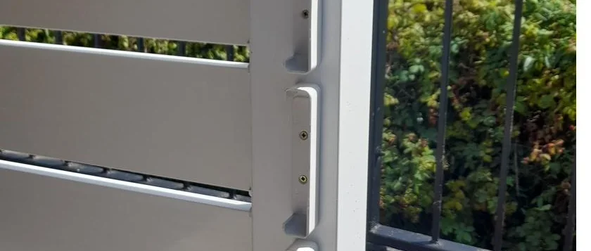 Horizontal ranch board being fitted from the front into Whitnall BoardClip